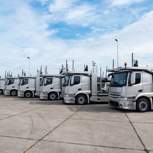 group-trucks-parked-line-truck-stop_342744-1296